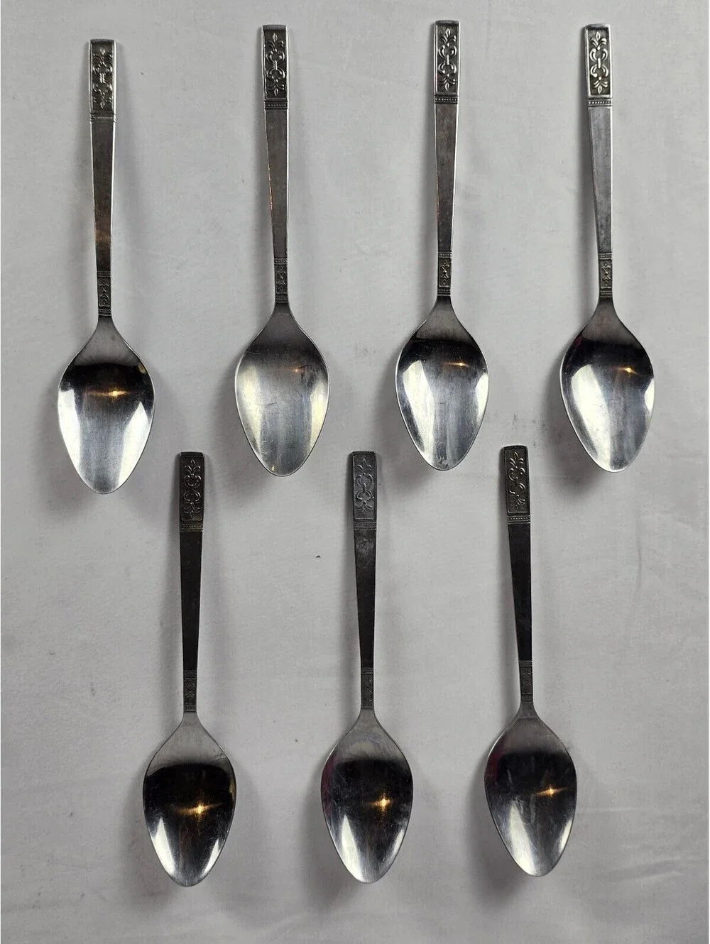 Customcraft Set of 7 Vintage Stainless Steel Table Spoons with Ornate Handles